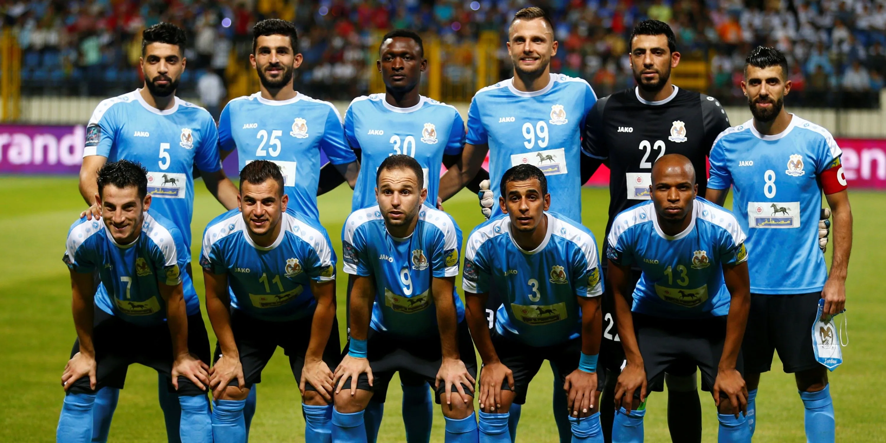 Các cầu thủ Al-Faisaly FC của Jordan ăn mừng chiến thắng